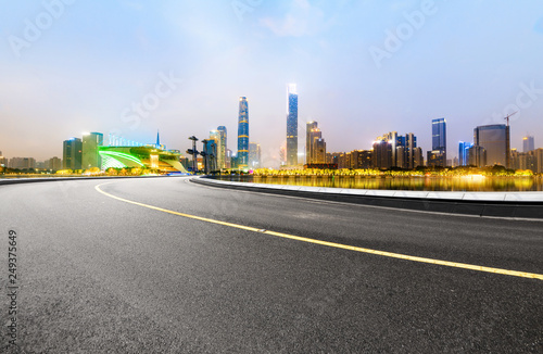 The expressway and the modern city skyline are in guangzhou  China.