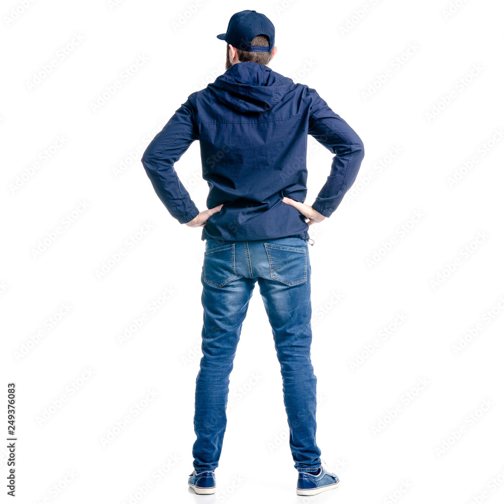 A man in jeans and jacket standing looking on white background isolation, back view A man in jeans and jacket standing looking on white background isolation, back view