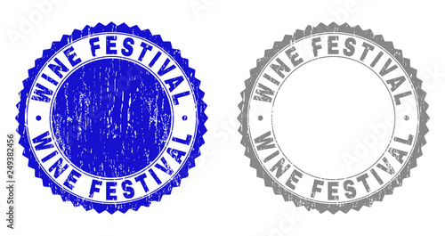 Grunge WINE FESTIVAL stamp seals isolated on a white background. Rosette seals with grunge texture in blue and grey colors. Vector rubber stamp imitation of WINE FESTIVAL text inside round rosette.