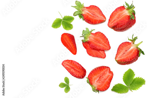 Fototapeta Naklejka Na Ścianę i Meble -  Strawberry with green leaf and slices isolated on white background. Healthy food. top view