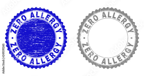Grunge ZERO ALLERGY stamp seals isolated on a white background. Rosette seals with grunge texture in blue and gray colors. Vector rubber stamp imitation of ZERO ALLERGY label inside round rosette.