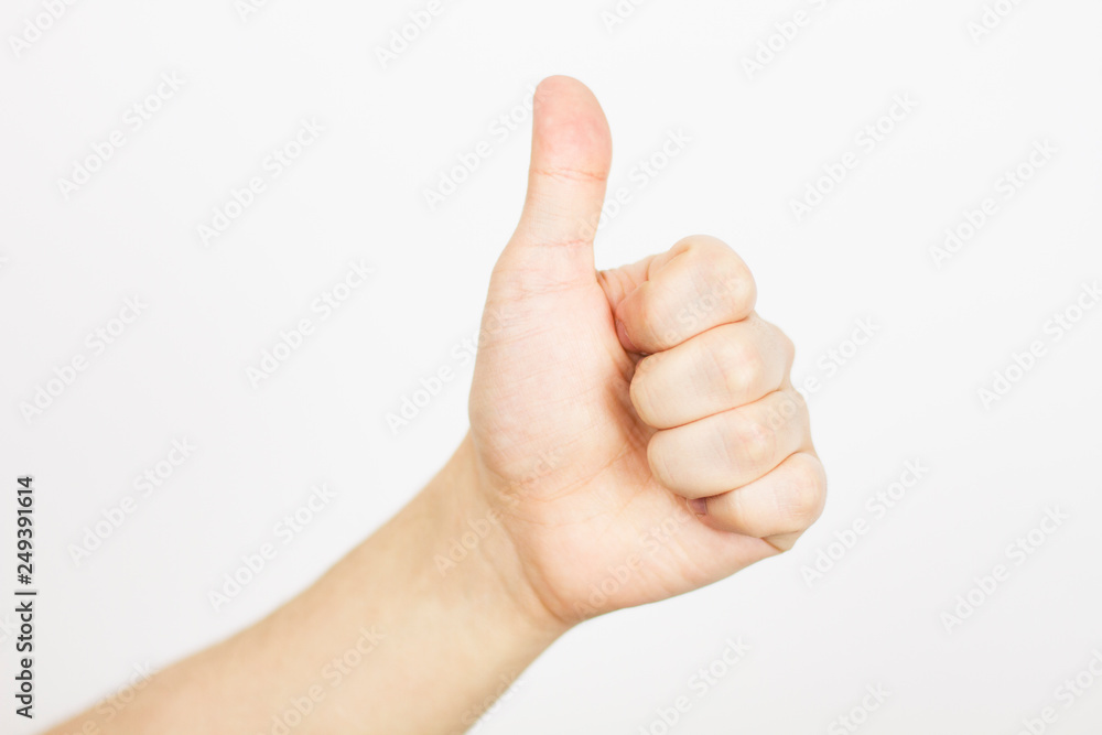 approving hand - showing like isolated on white, copy space - selective focus approving hand - showing like isolated on white, copy space - selective focus