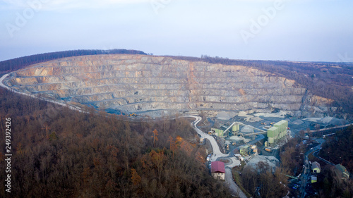Aerial view of the quarry from which rocks are extracted during the winter day