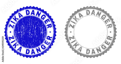 Grunge ZIKA DANGER stamp seals isolated on a white background. Rosette seals with grunge texture in blue and grey colors. Vector rubber stamp imprint of ZIKA DANGER tag inside round rosette.