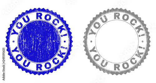 Grunge YOU ROCK! stamp seals isolated on a white background. Rosette seals with grunge texture in blue and grey colors. Vector rubber stamp imprint of YOU ROCK! title inside round rosette.
