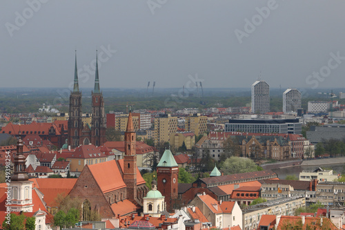 View from the tower of the church of St. Elizabeth to the Cathedral, Ostrów Tumski, old town, churches, Odra River, the Olympic Stadium, dormitories, blocks of flats. Wrocław, Breslau, Wroclaw, Poland
