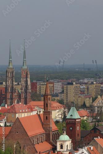 Warm, spring day in Wroclaw. View from the tower of the church of St. Elisabeth to the old town, churches, buildings, tenement houses, office blocks, blocks of flats. Breslau, Wrocław, Poland, Polen