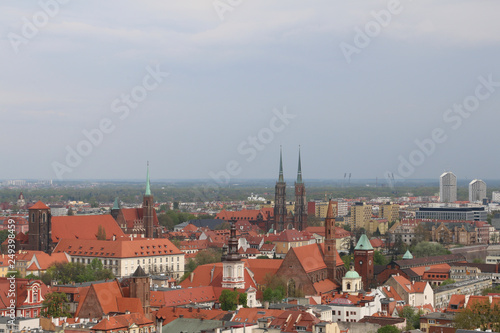 Warm, spring day in Wroclaw. View from the tower of the church of Saint Elizabeth to the Cathedral, Ostrów Tumski, old town, churches, Odra River, blocks of flats, the Olympic Stadium, dormitories