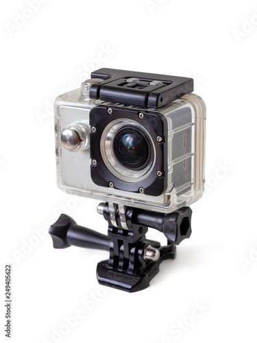 Digital action camera with transparent box for underwater video shooting and helmet mounts. Video camera for active people