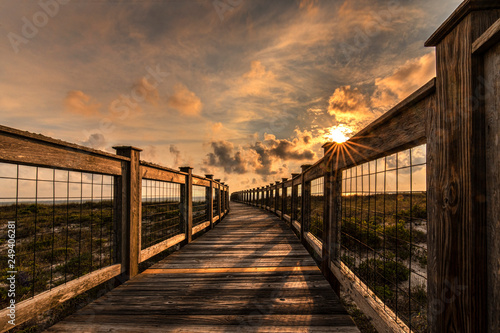 Boardwalk at the Beach Setting Sun