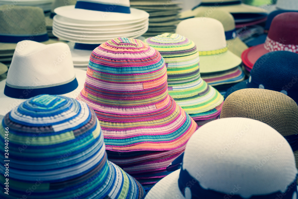 Close-up of different hats for sale for men and women