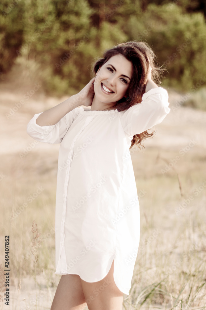 Portrait of pretty woman on the beach. Beauty female face outdoor portrait, pretty healthy girl relaxing outside. Portrait of pretty woman on the beach. Beauty female face outdoor portrait, pretty healthy girl relaxing outside.