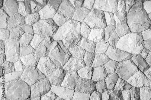 Grey stone wall background, modern rough chipped surface floor texture