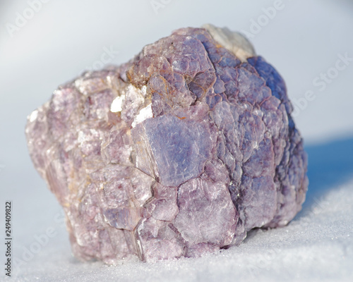 Canvastavla Rough Purple Lepidolite cluster from Brazil on white snow at a sunny winter day