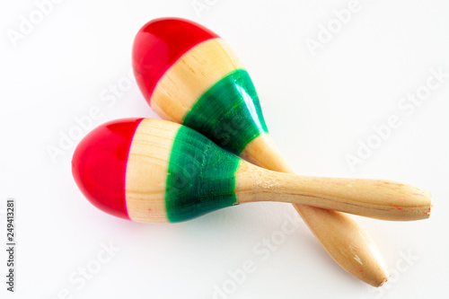Two colorful maracas on white background. Cinco de mayo background.