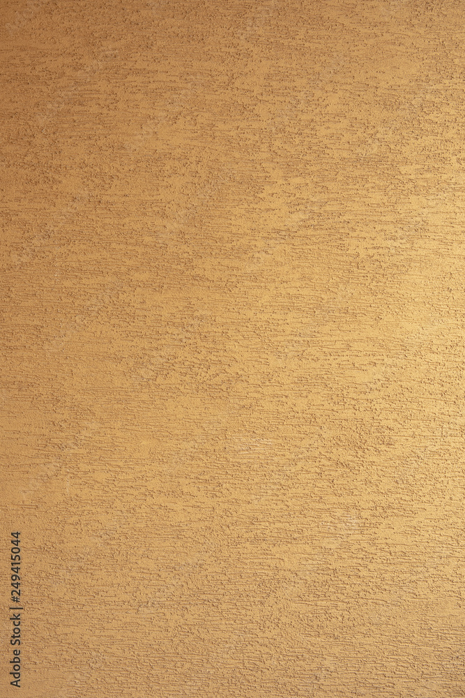 Fototapeta premium Abstract yellow cement wall texture