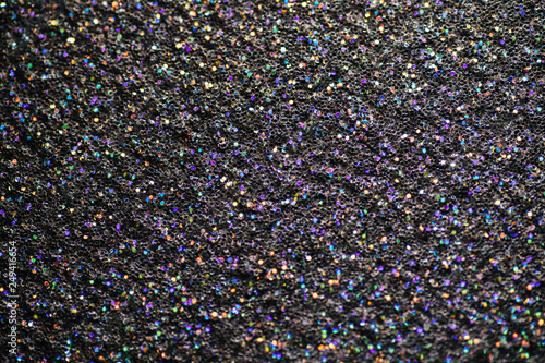 Beautiful glitter with large bokeh macro lens used on the multicolored sparkling surface