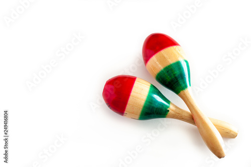 Fotografie Two colorful maracas on white background
