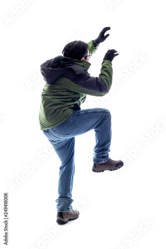 Fotografia Mountain climber or hiker isolated on a white background for composites