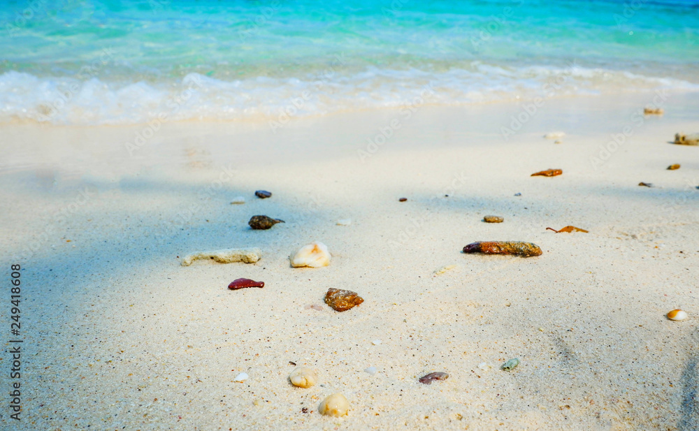 Beautiful beach and blue sea on the beach with rock on sand island natural ocean Beautiful beach and blue sea on the beach with rock on sand island natural ocean