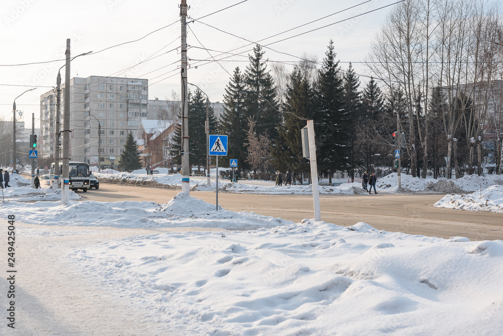 Urban winter landscape of Russia. City under the snow. Winter on the streets. City in Siberia.