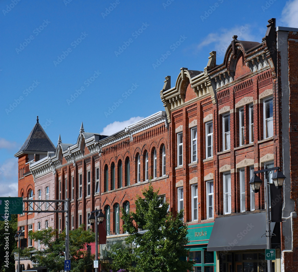 Fototapeta premium Facades of preserved 19th century commercial buildings of the type found in some older North American small town main streets