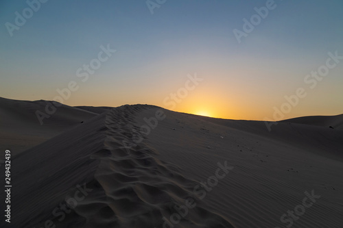 Desert during sunset at Huacachina Oasis in Ica  Peru.