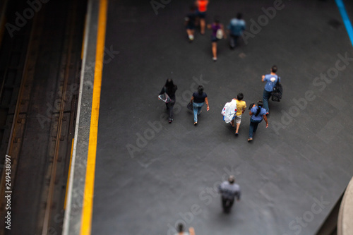 Mockup model style urban landscape - people on subway train platform - real tilt-shift TS lens