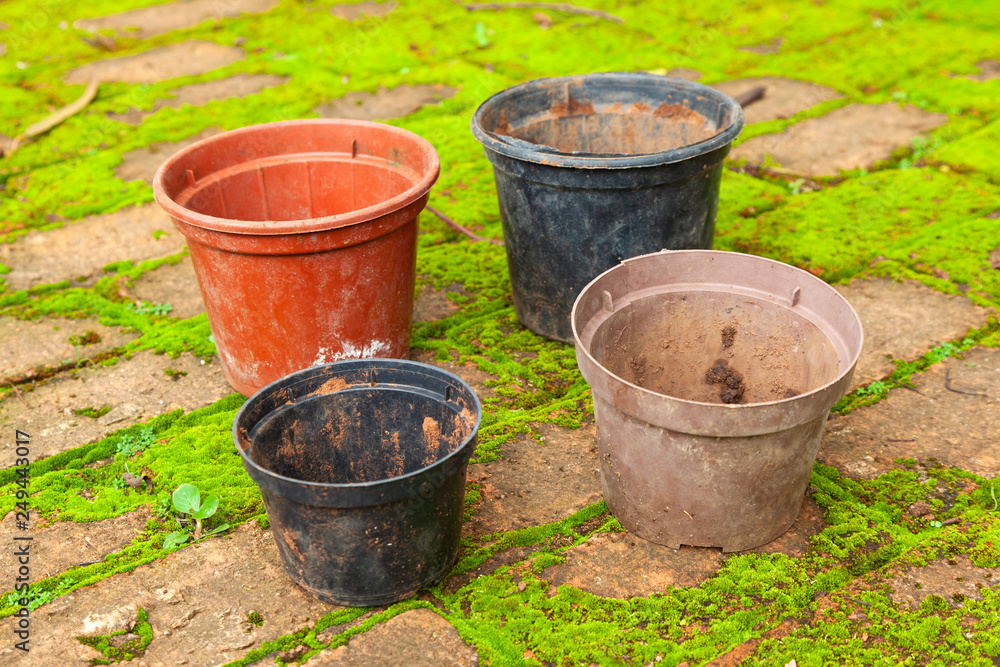 Colored empty flowers pot for gardening - mud dirt used