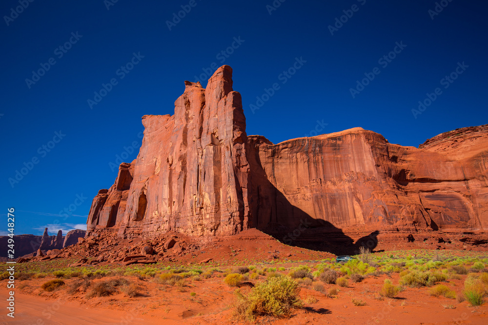 Fototapeta premium Monument Valley. Navajo Tribal Park. Red rocks and mountains. Located on the Arizona–Utah border. USA