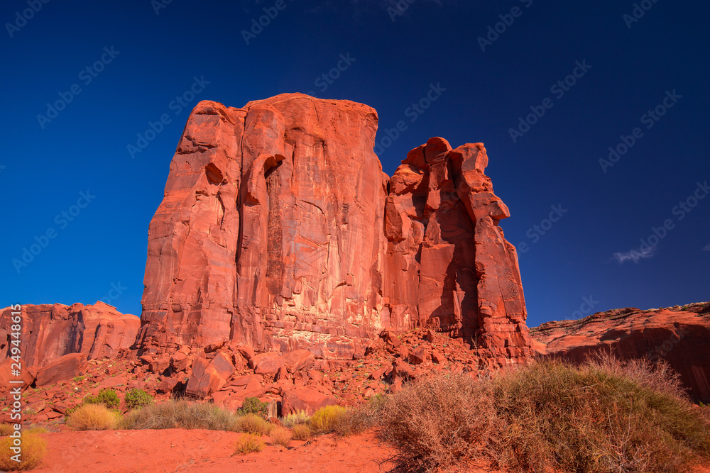 Fototapeta premium Monument Valley. Navajo Tribal Park. Red rocks and mountains. Located on the Arizona–Utah border. USA