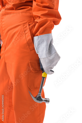closeup hand of a woman worker in Mechanic Jumpsuit is holding hammer isolated on white background