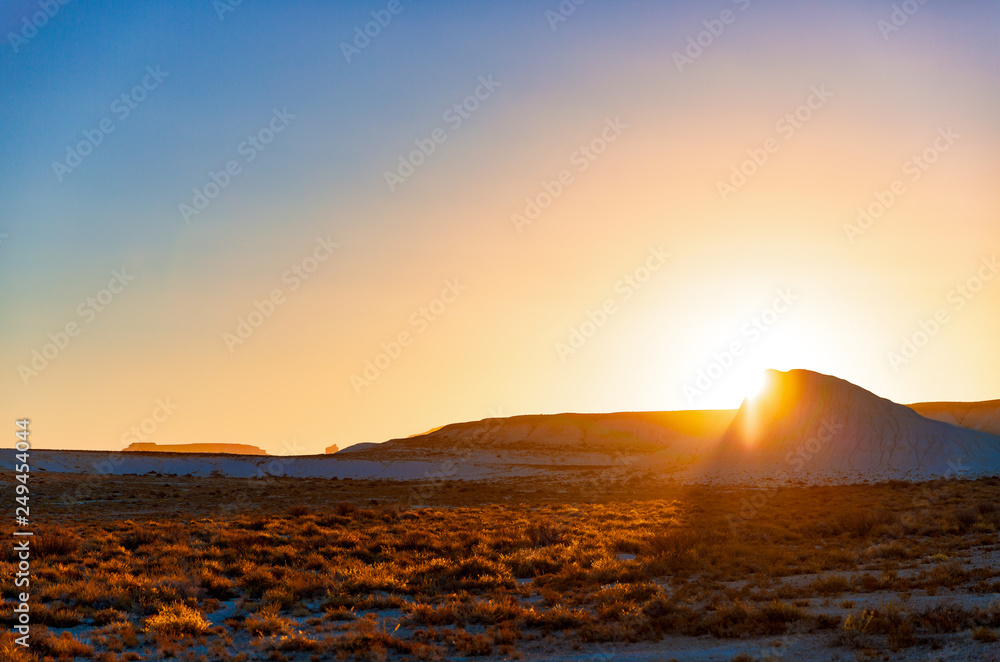 A stunning sunrise view of the Giant Stone Yurt, Bozzhira, Mangystau, Kazakhstan