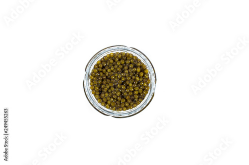 Gold - Yellow caviar in a bowl on a white background. High price