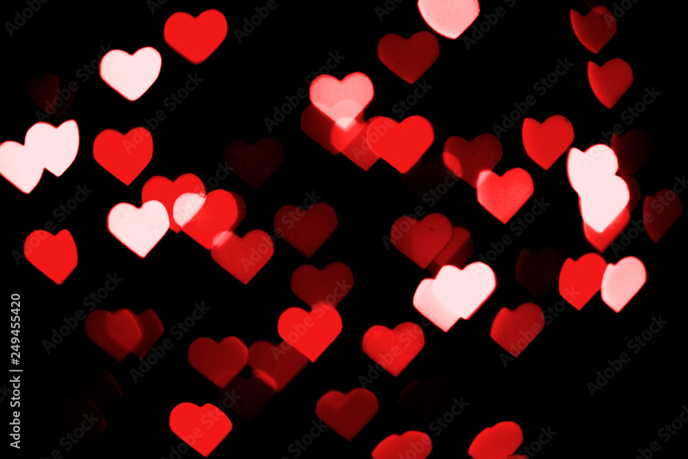 Multicolored bokeh on black background. Heart shape. Love Concept,  Valentine's Day. Can be used as a background or wallpaper Stock Photo |  Adobe Stock