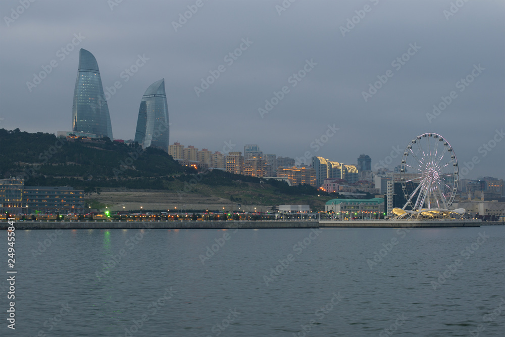 View of the city embankment in January twilight. Baku, Azerbaijan