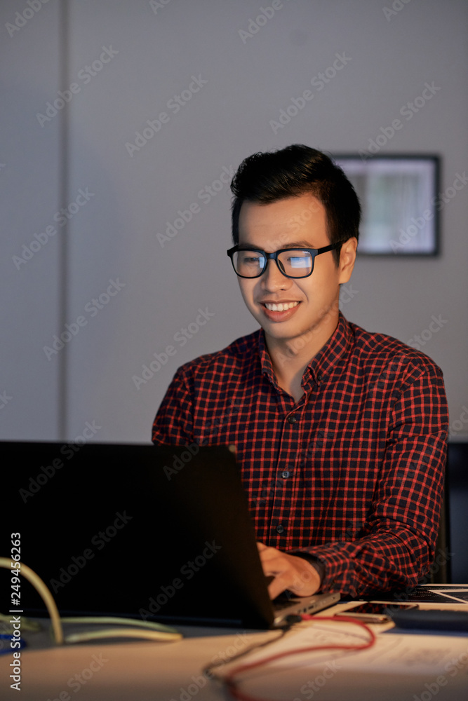 Web designer working on laptop Web designer working on laptop