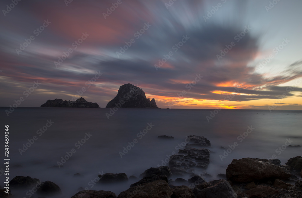 Sunset on the island of Es vedra in Ibiza
