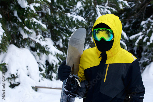 snowboarder in a yellow jacket