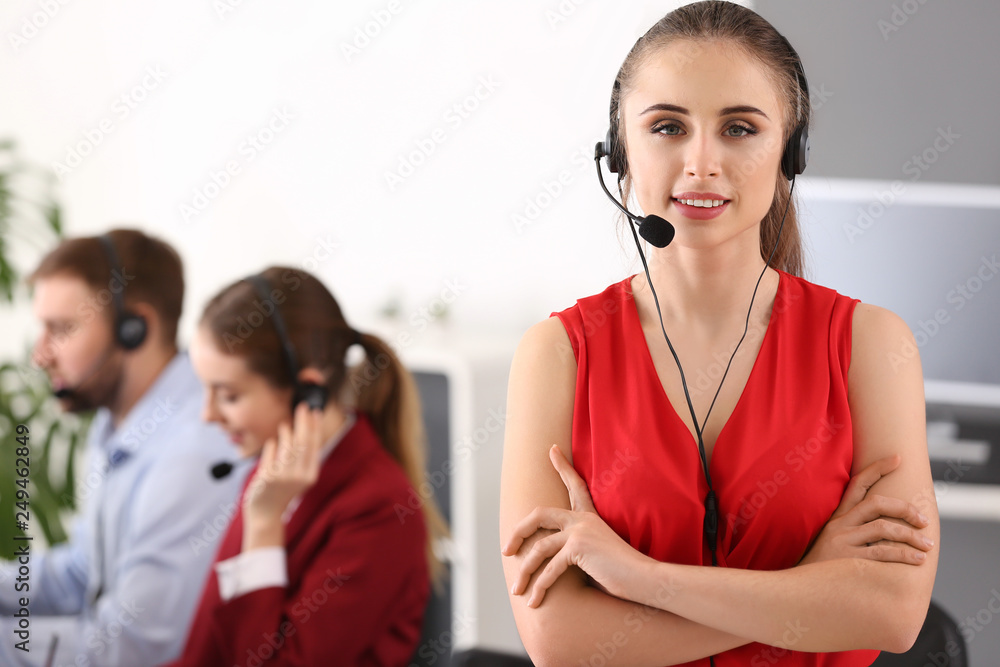 Portrait of female technical support agent in office Portrait of female technical support agent in office