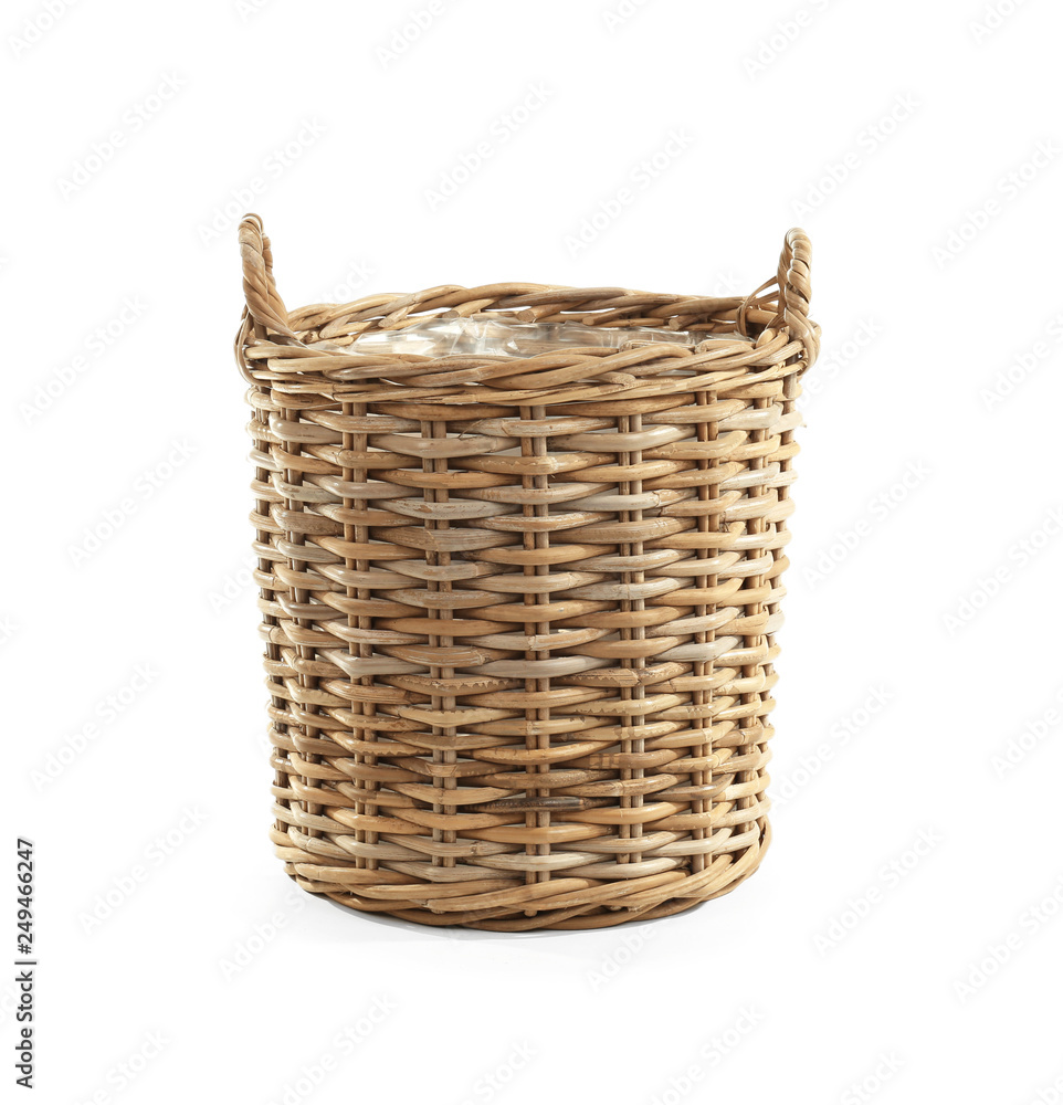 Obraz premium Wicker basket on white background