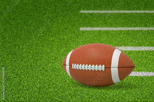 3d rendering of a ball for American football lying on green pitch grass with white lines on the right and with copy space on the left.