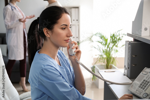 Female receptionist talking...
