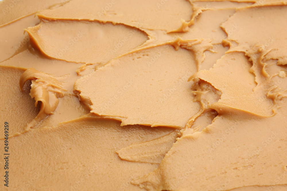 Texture of tasty peanut butter, closeup Texture of tasty peanut butter, closeup