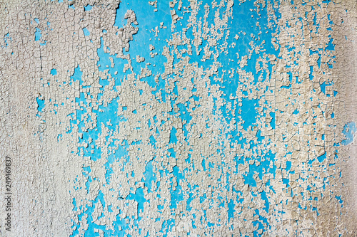 dry white paint texture with a blue background