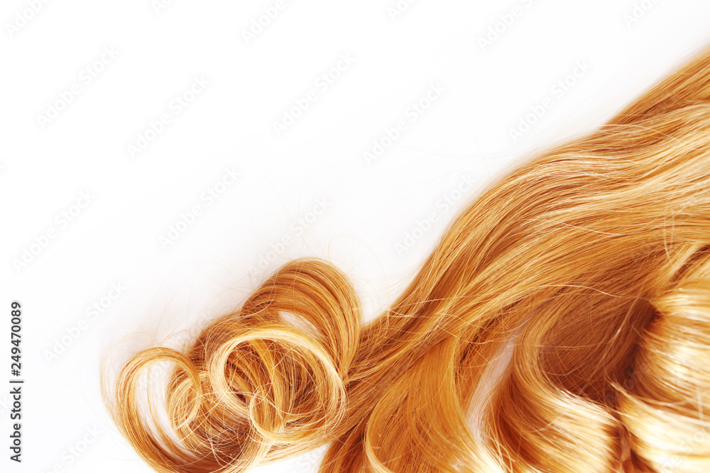 Blonde hair isolated on white background. strand of light or red hair, hair care Blonde hair isolated on white background. strand of light or red hair, hair care