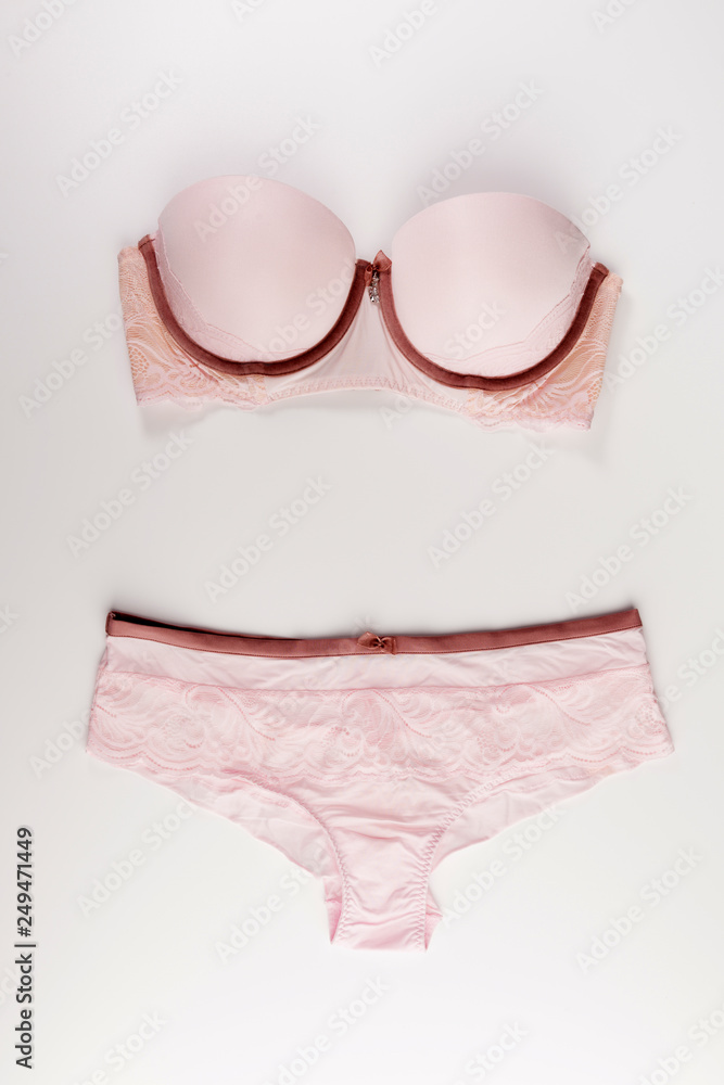 pink tender lingerie set isolated on a white background, top view pink tender lingerie set isolated on a white background, top view