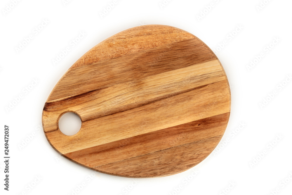 A photo of a wooden cutting board, shot from the top on a white background with a place for text. A cooking frame with copy space A photo of a wooden cutting board, shot from the top on a white background with a place for text. A cooking frame with copy space