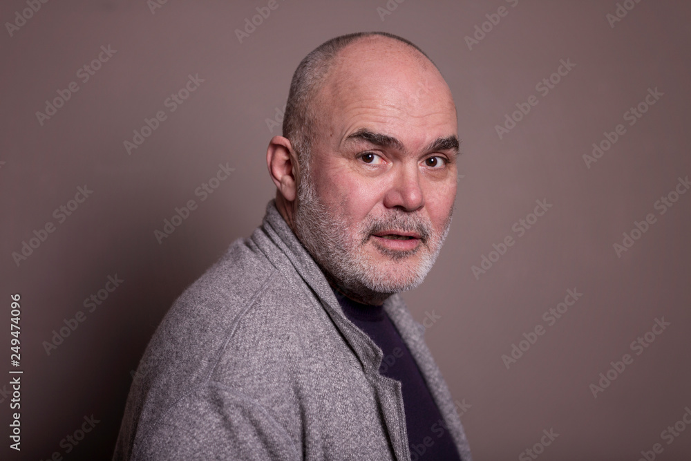 Fototapeta premium Stylish elderly gray-haired man, close-up
