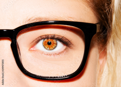 A beautiful insightful look woman's eye. Woman wearing glasses. Close-up shot
